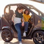 tazzari zeromax sfeerbeeld in het zwart met groen zijaanzicht