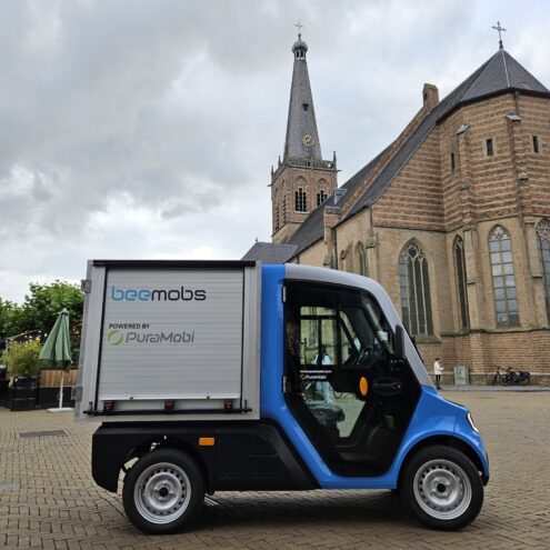 Beemobs bee1 in doetinchem zijaanzicht met kerk op de achtergrond puramobi